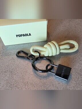 PDPaola Cream Leather Knot Keychain with Black Metal Ring and Padlock